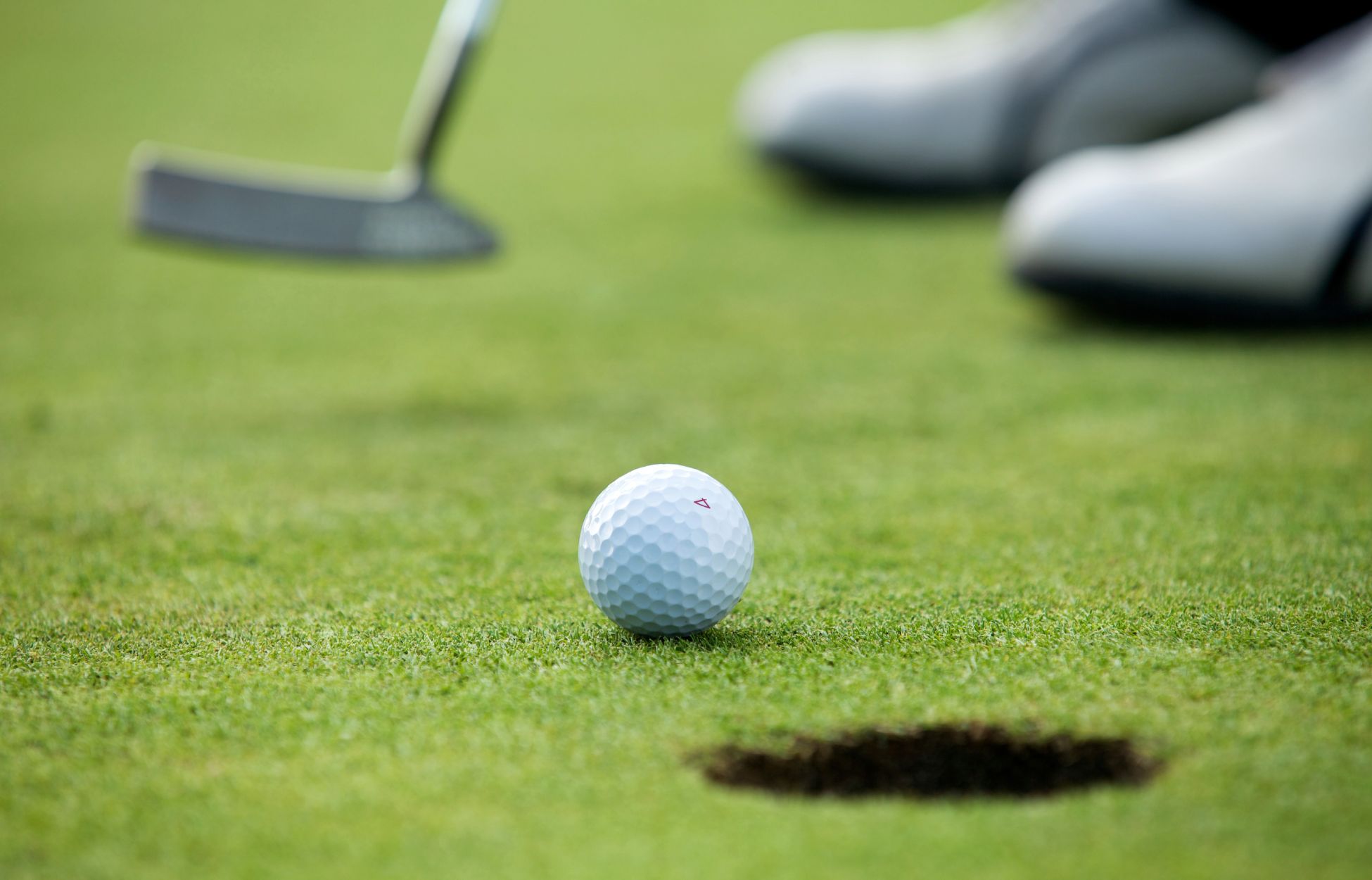 golf ball on a putting green.