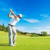 A man playing golf